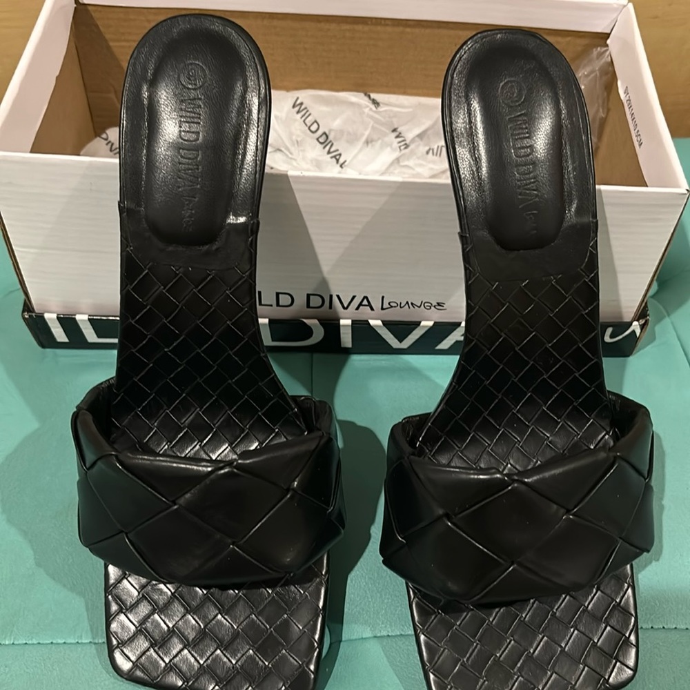 Black slip on heel in black size 9
